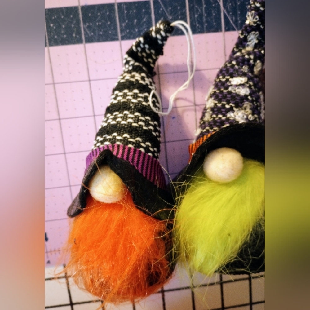 Four piece set of holiday gnomes